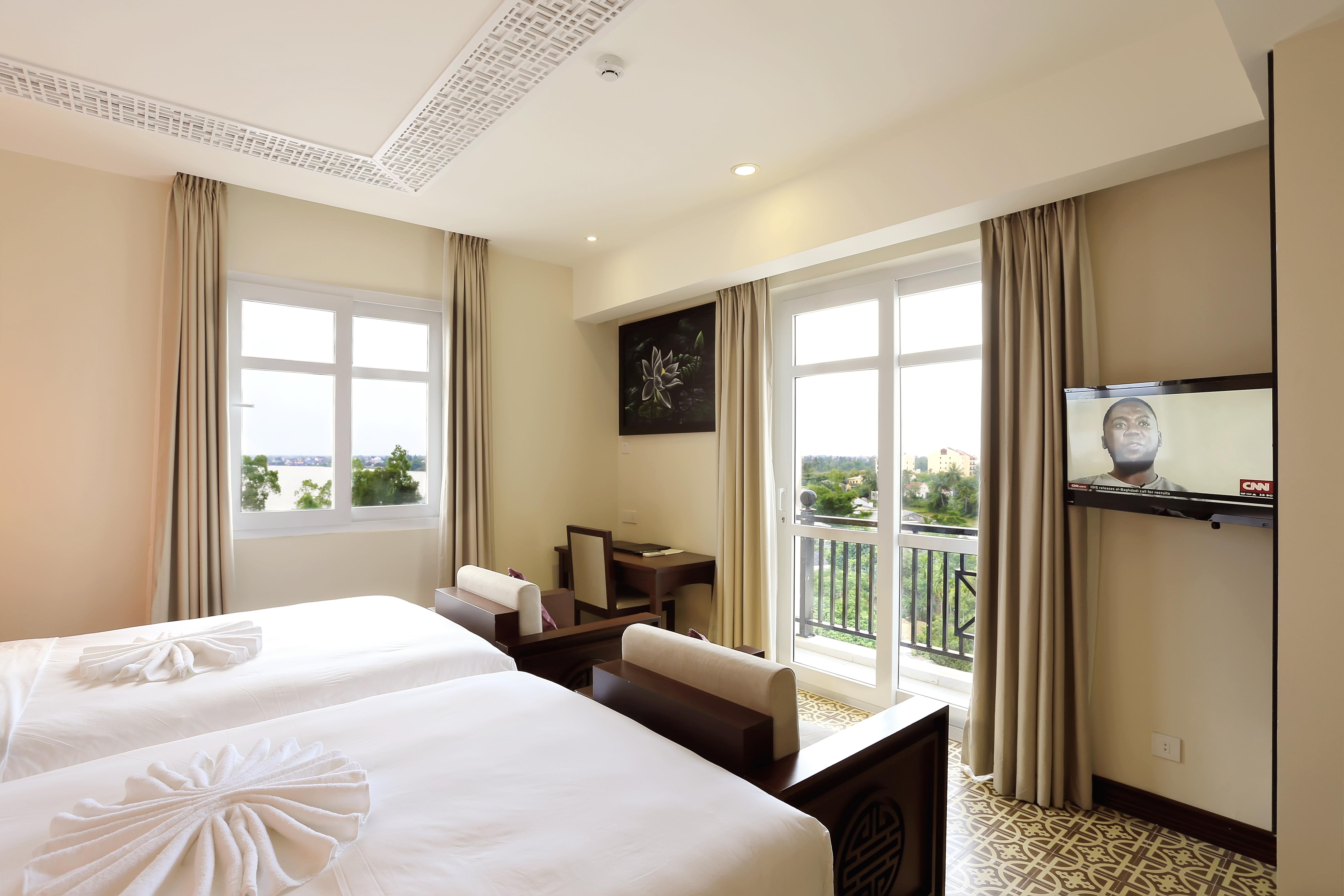 Royal Riverside Hoi An Hotel & Spa Экстерьер фото